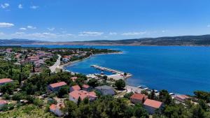 an aerial view of a small town next to a body of water at Vila Velebita in Seline