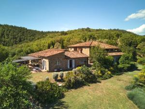 an aerial view of a house in the mountains at La Locanda Volpaia in Radda in Chianti