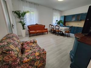 a living room with a couch and a table at Contry House Atessa in Atessa