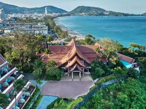 an aerial view of a building next to the ocean at Novotel Phuket Resort in Patong Beach