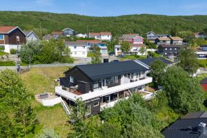 an aerial view of a house in a village at Panorama view! Modern,Balcony/parking in Bodø