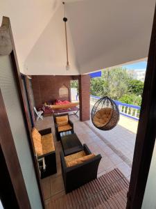 an overhead view of a living room with chairs and a table at Chez Bouchra suite Royal in Pont Blondin