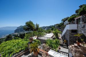 a view from the balcony of a house with plants at Casa Clotilde - nel Cuore di Capri in Capri