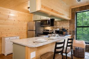 a kitchen with a large counter top in a cabin at Mountain Views at Dolly's Castle Unit 3 in Sevierville
