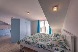 a bedroom with a bed and a large window at Villa Sandy Apartments in Tivat +25 photos