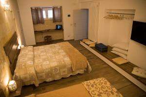 Postel nebo postele na pokoji v ubytování Casa Rosselli