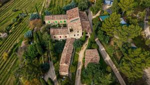 an aerial view of an old house in a field at Le Degoutaud in Le Barroux