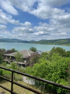 a house with a view of a lake at Lake View Sioni in Sioni