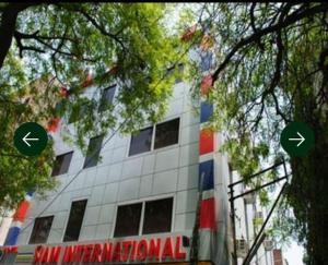 a building with two arrows on the side of it at Hotel Siam International Karol Bagh New Delhi in New Delhi