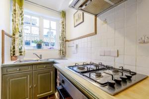 a kitchen with a stove and a sink at 2 Bed in Newark oc-o36894 in Newark-on-Trent +16 photos