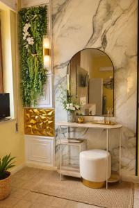 a bathroom with a sink and a mirror at Suite la Ficara in Bovalino Marina