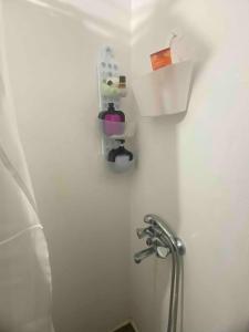 a bathroom with a sink and a faucet at Studio DKMK in Malia +10 photos