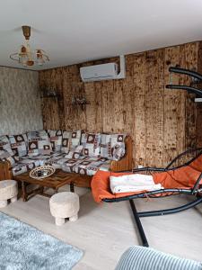 a room with two bunk beds and a table at Chez JF et ISA in Bussang
