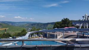 a water park with a pool and a slide at Ferienhaus Mosel/Trittenheim in Trittenheim