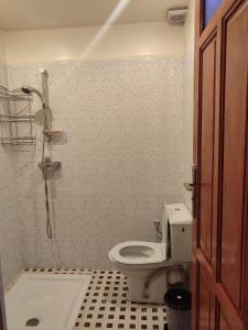 a bathroom with a toilet and a shower at Chambre d'hôte in Midelt +29 photos