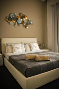 a bedroom with a large bed with at Villa Mida in Calatabiano +74 photos
