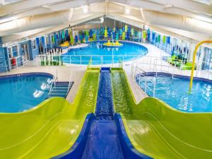 a large indoor swimming pool with two pools at 7 Jay Valley in Bridlington