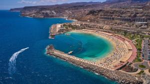an aerial view of a beach with turquoise water at AMADORES BEACH VIEW APARTMENT in Amadores +62 photos