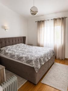 a bedroom with a large bed in a room at La Hacienda Percobic-Serenity & private pool in Bar +41 photos