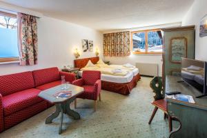 Postel nebo postele na pokoji v ubytování Hotel Anemone