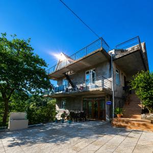 a large house with a balcony and a patio at 53 jincharadze street Makhinjauri, Batumi in Batumi