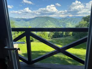 a view from a window of mountains at Погарь Квасівський in Kvasy +10 photos