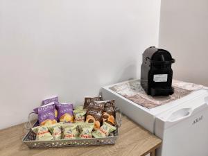 a tray of food sitting on a counter next to a washing machine at Casa vacanze Poma in Custonaci