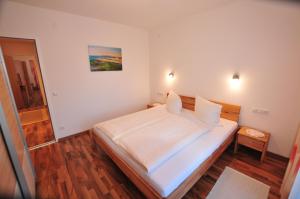 Letto o letti in una camera di Haus Scheiber