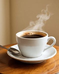 a cup of coffee on a plate on a table at Hotel Zackenbarsch in Huánuco +7 photos