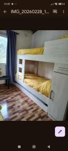 a bedroom with two bunk beds in a room at La Elegida Villars in General Las Heras +6 photos