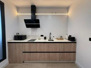 a kitchen with a sink and a counter top at Apartamento Casa Nela 3 in Medellín