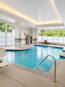 a large swimming pool in a hotel room at SpringHill Suites by Marriott Atlanta Buckhead in Atlanta