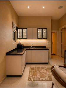 a kitchen with a sink and a counter top at Lumina View Hotel by Tahrir - Downtown in Cairo