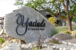 a sign for the entrance to a park at Designer Lakefront Condo C1 Wapato Point Chelan in Manson