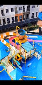 an aerial view of a large water park at Transpark Juanda by Aqillaroom in Padurenan