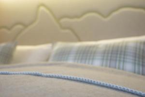 Postel nebo postele na pokoji v ubytování Ferienwohnung In den Bergen