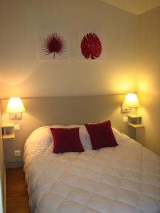 Ένα ή περισσότερα κρεβάτια σε δωμάτιο στο VVF Bourgogne Auxois Morvan