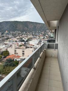 a balcony with a view of a city at Luxury in Villa Carlos Paz