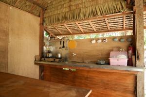 a kitchen with a counter in a room at Kabilin Homestay in General Luna