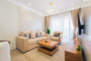 a living room with a couch and a coffee table at Everlett Lavington Homes in Nairobi