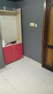 a kitchen with a red cabinet in a room at Huzur 30 in Edirne