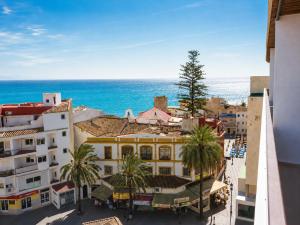an aerial view of a city with the ocean at Nogalera Sea View Luxe in Torremolinos