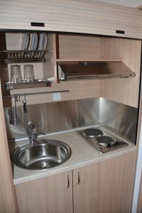 Кухня или мини-кухня в City Point Chios
