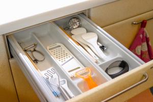 a drawer filled with various kitchen utensils at 網代温泉源泉かけ流し 阿治古の宿 in Atami +58 photos