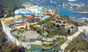 an aerial view of a water park with a roller coaster at Cipango - Hong Kong Houseboat in Hong Kong