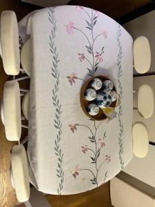a table with a plate with a bowl of dishes at 悠の宿 in Katsuyama
