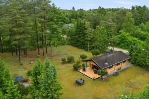an aerial view of a house in the woods at Peaceful Holiday Home Close To Nature in Glesborg