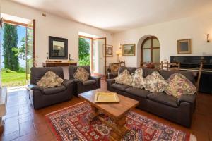 Et opholdsområde på Casale Tigli - Happy Rentals + 33 billeder
