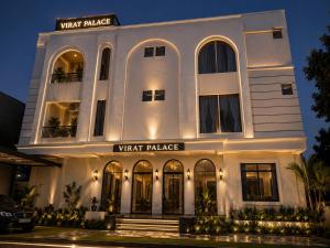a white building with a sign that reads wait palace at Hotel Virat Palace 600 From Khatu Shyam Ji in Khātu