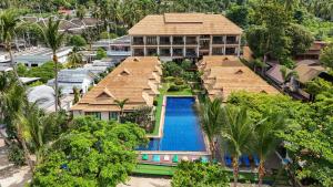 an aerial view of a resort with a swimming pool at Poolsawat Villa - SHA Plus in Lamai